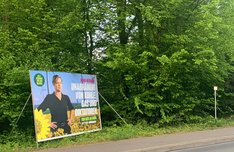 Großplakat im Naturschutzgebiet Gruppe Cox Bergisch Gladbach